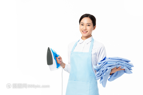 家政服务女性熨烫衣服